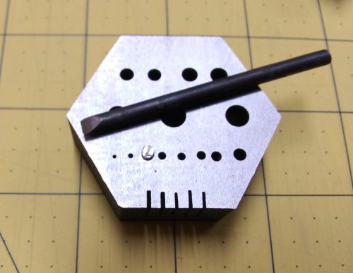 Judy Larson's Tool Tip - Steampunk or Industrial Rivets  - , Tools For Wire Jewelry, Riveting, Riveting Techniques, Wire Rivets, punch a line in the center of the rivet head